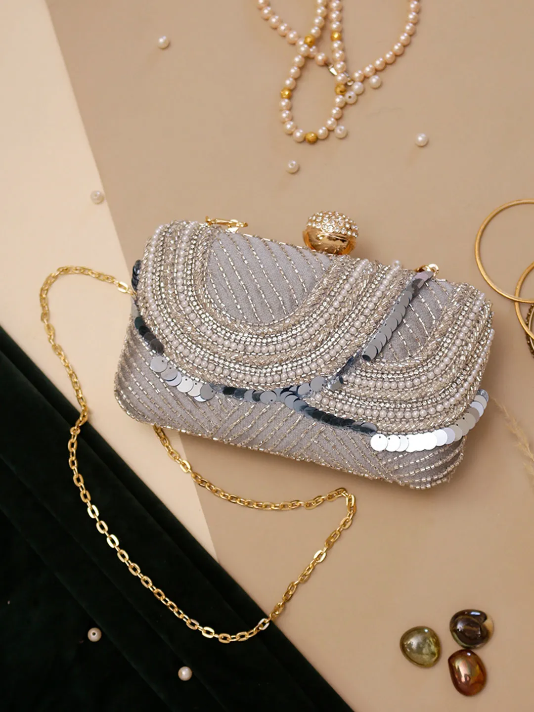 Swisni grey embroidered clutch bag