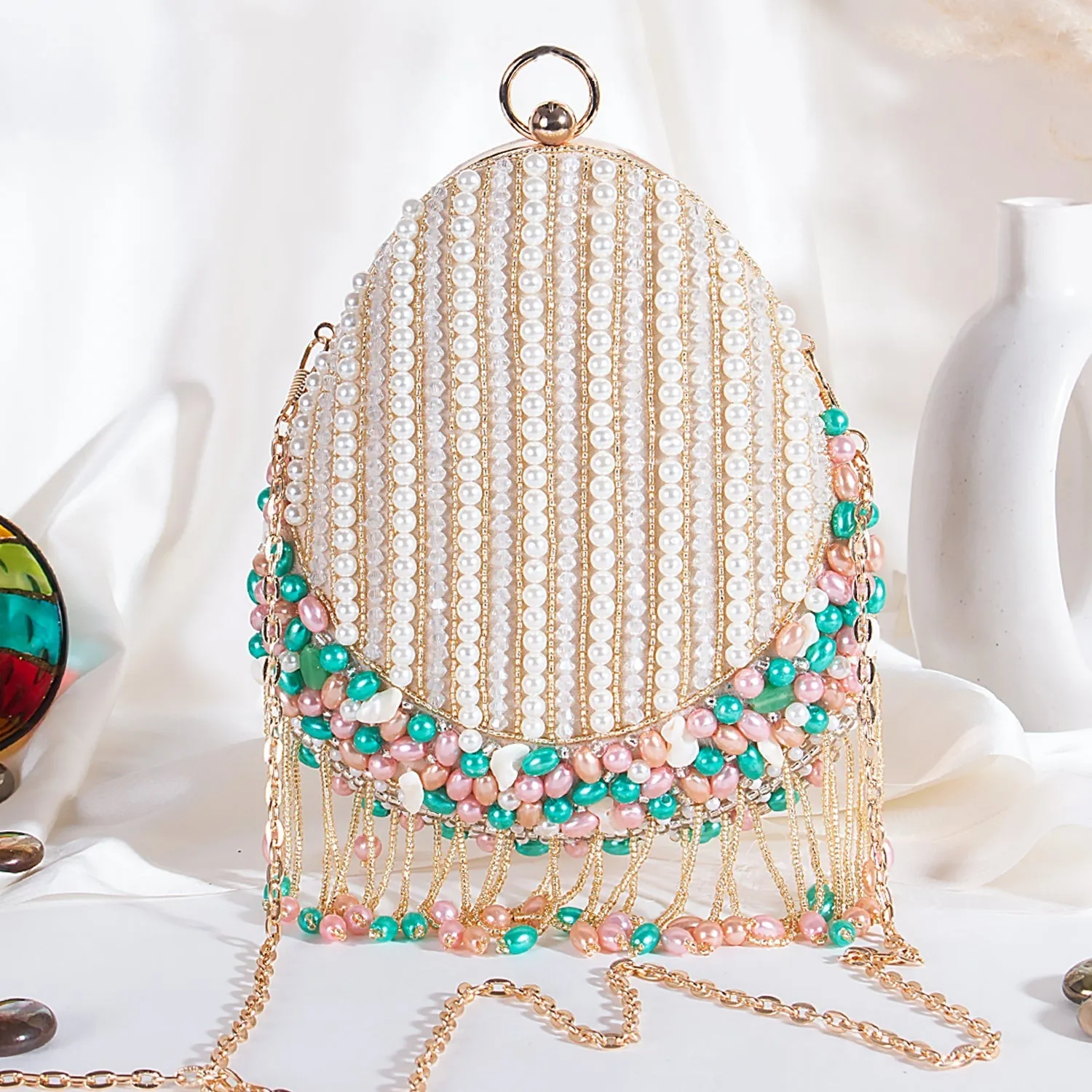 Swisni tassel almond shape clutch